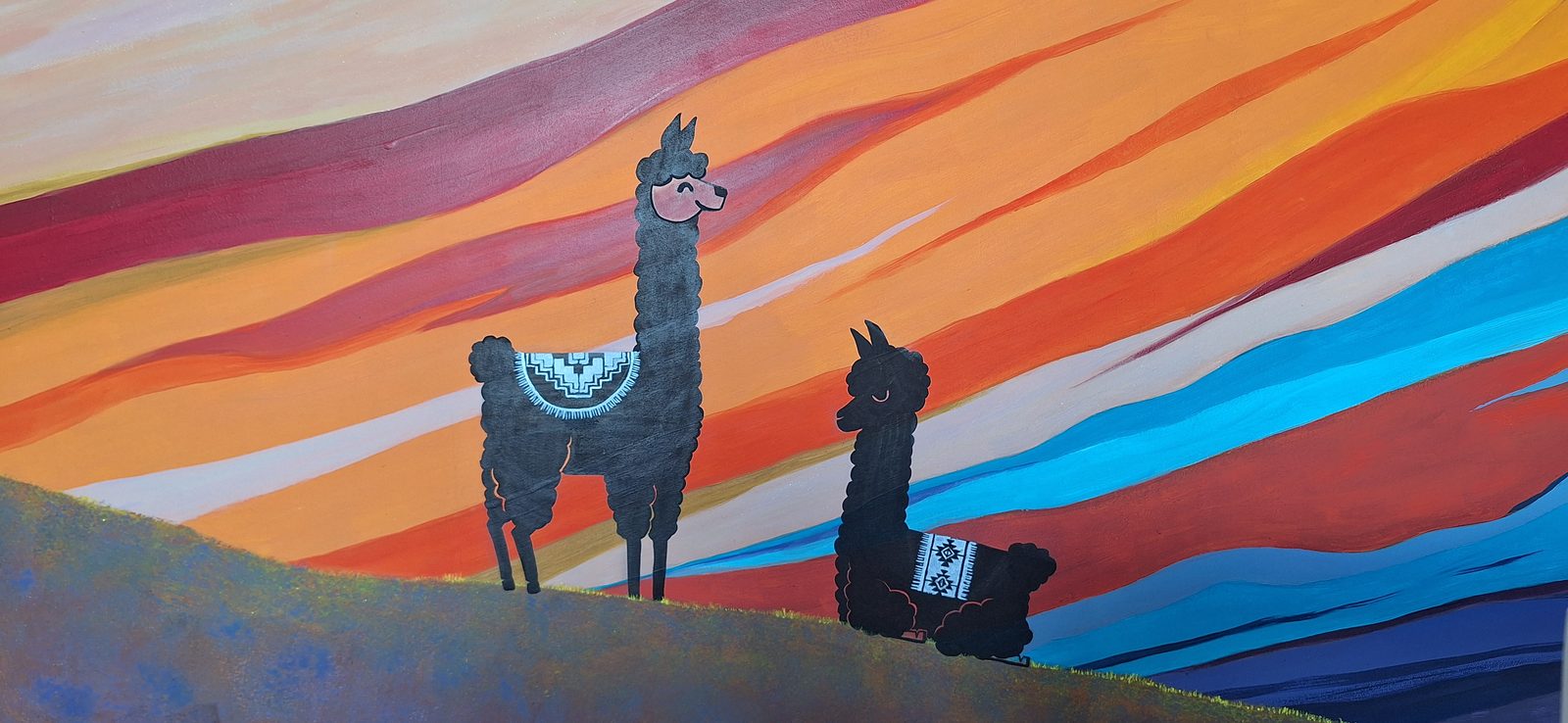 Fresque de lamas peints dans une chambre d'enfant